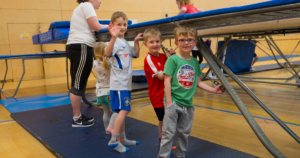 Young children enjoying a trampoline class.