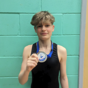 Lorcan with London Gymnastics medal